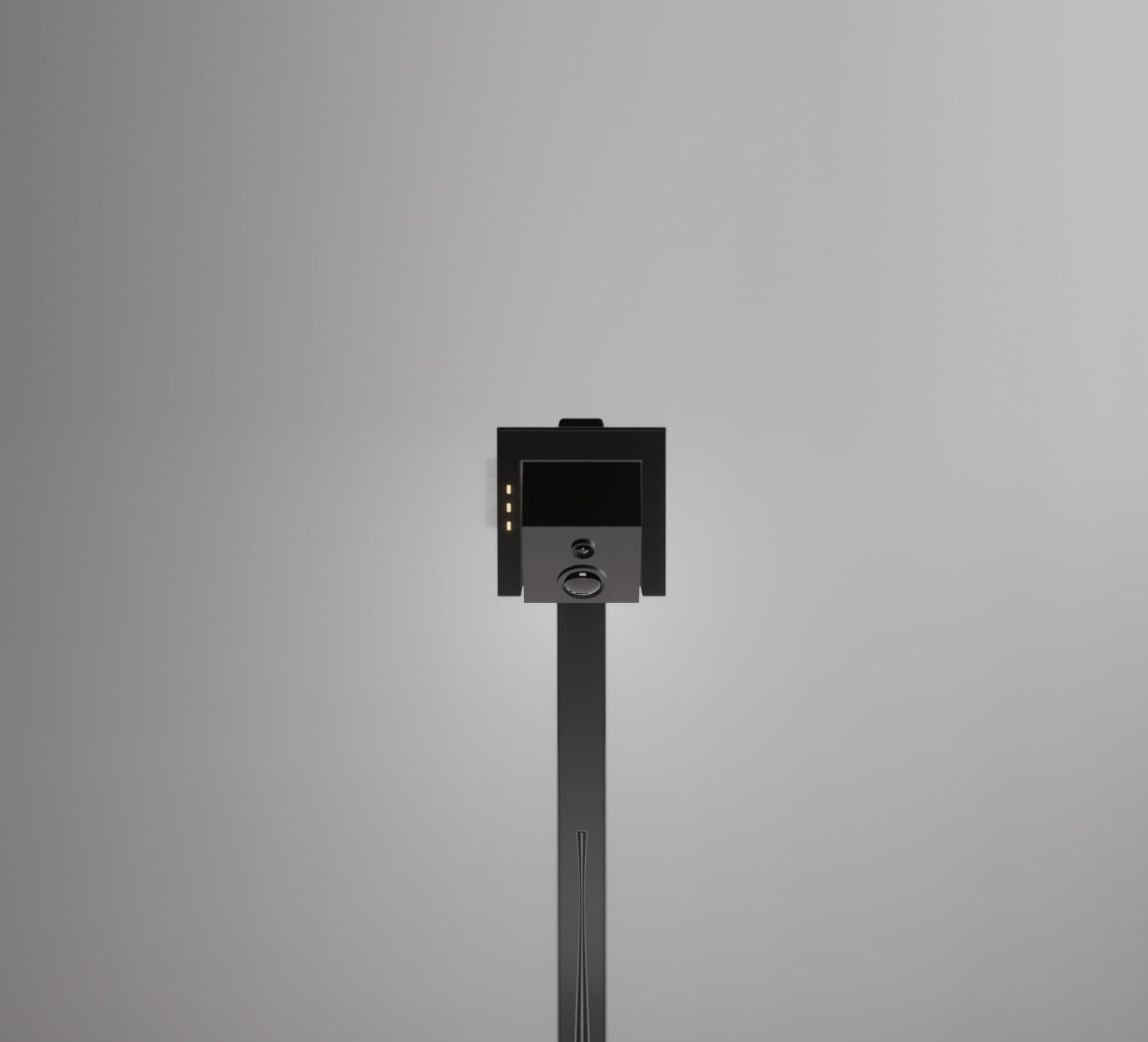 Rippl projector lamp on a study desk, illuminating an open book